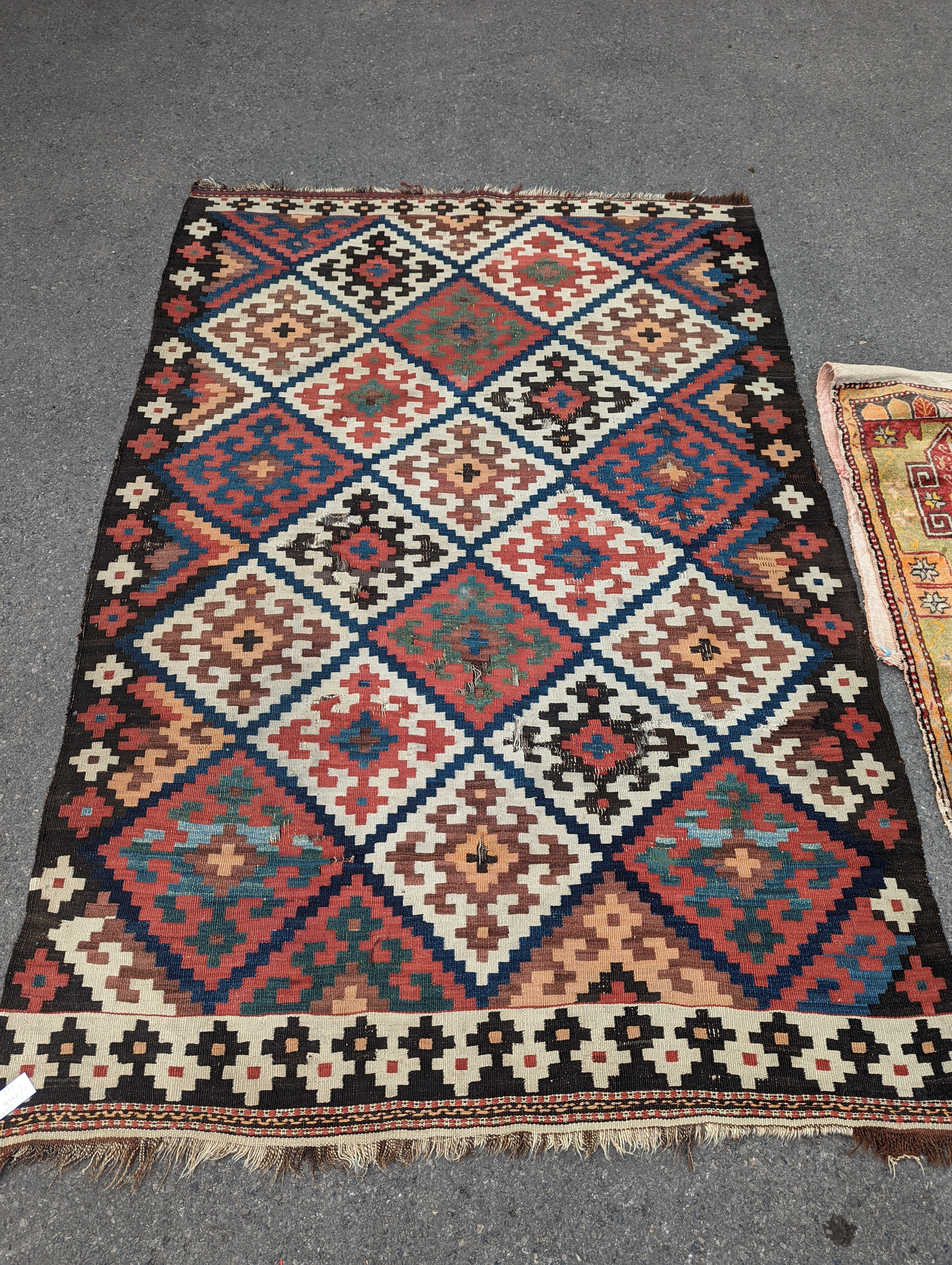 A Persian tribal Kelim carpet, 230 x 158cm and a Turkish bag